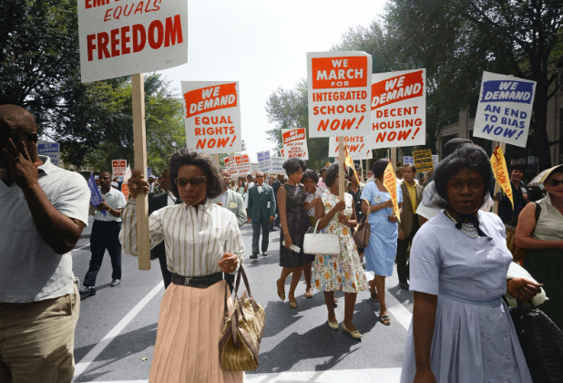 Civil rights marchers demand decent housing in photo shared by Unseen Histories